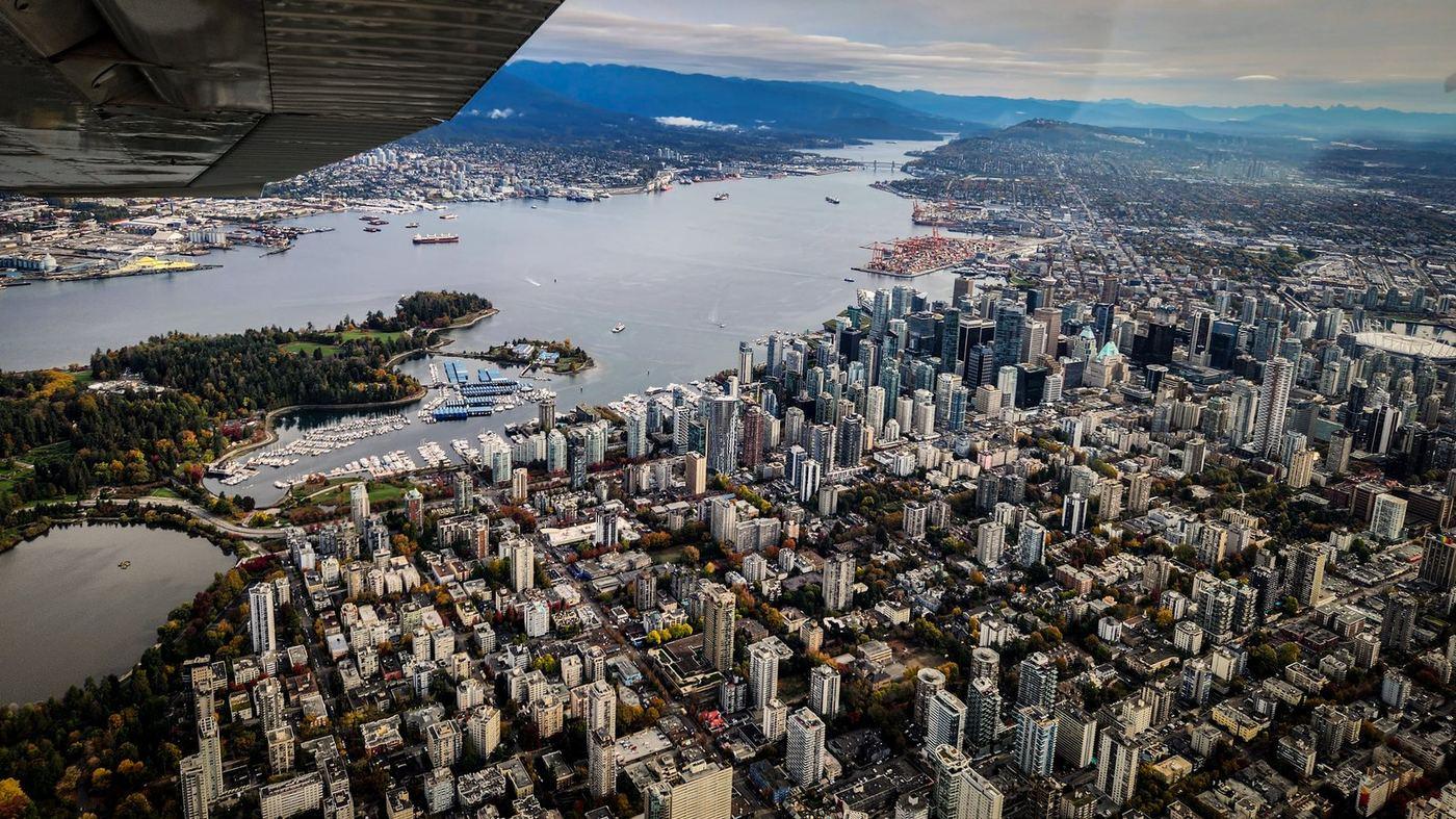 Aerial view over Metro Vancouver, looking across Burrard Inlet to the North Shore mountains